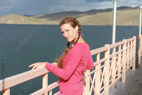 woman standing on pier