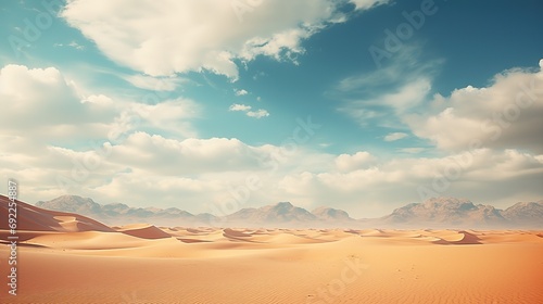 Beautiful landscape of desert dunes mountains with bright clouds sky
