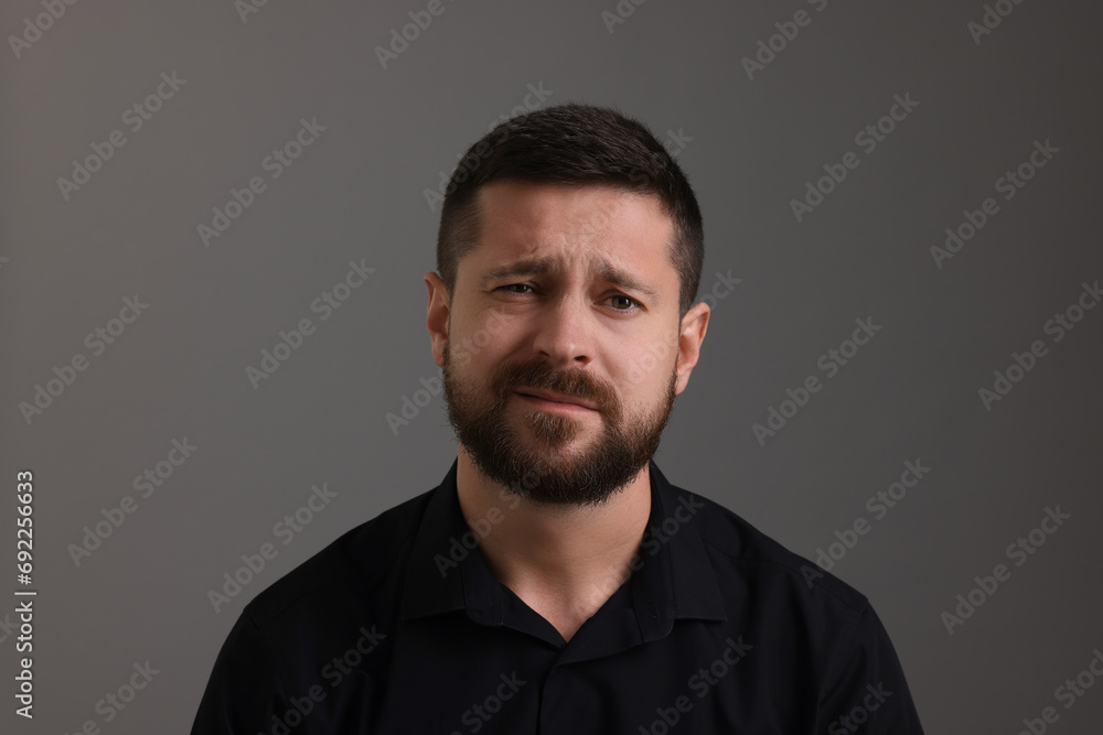 Personality concept. Emotional man on grey background Personality concept. Emotional man on grey background