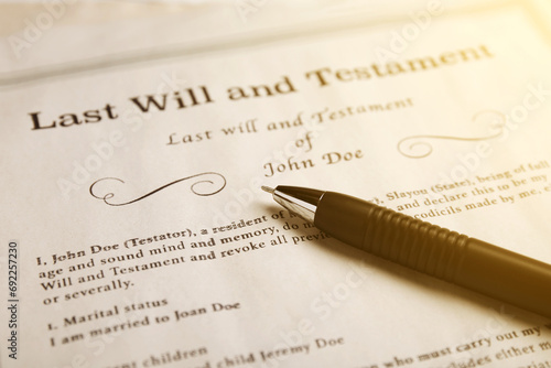 Last Will and Testament with pen, closeup photo