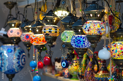 Colorful lamps hanging at a Christmas market stall