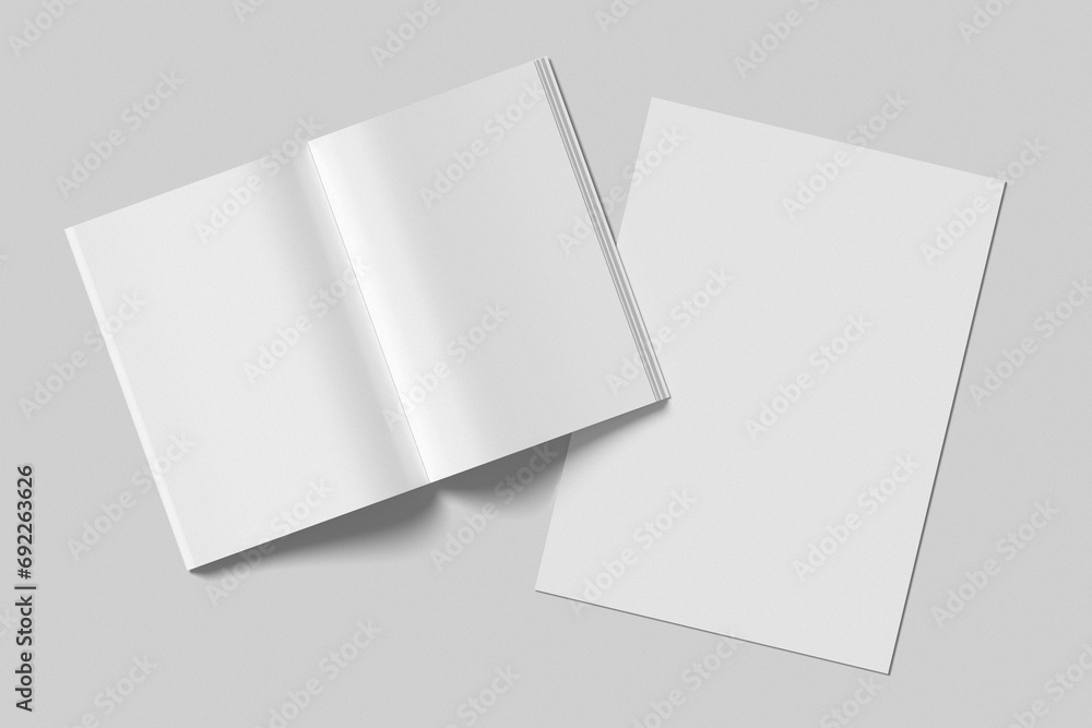 Top view of book and paper mockup on gray background Top view of book and paper mockup on gray background