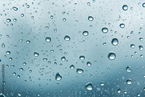 Clarity After Rain: Water Droplets on a Clear Glass Surface