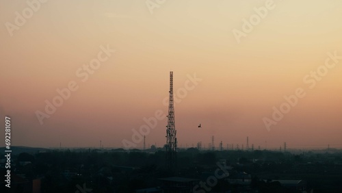 communication tower at sunset