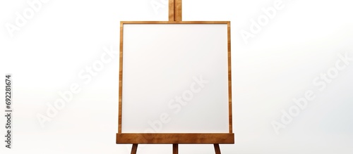 Easel holding an empty frame for painting.