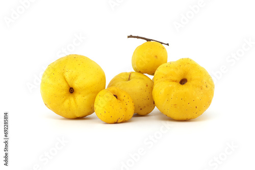 Golden-yellow quince fruits isolated on white background