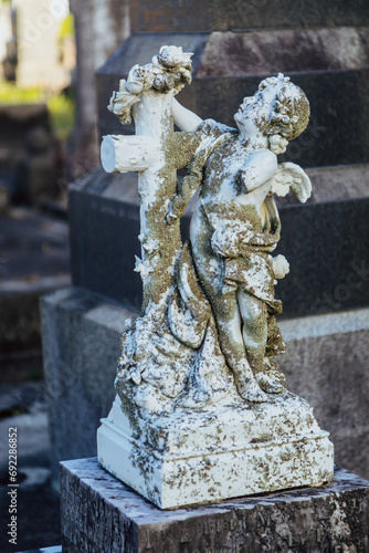 Angel headstone statues in the  Waikaraka Cemetery. Auckland, New Zealand photo