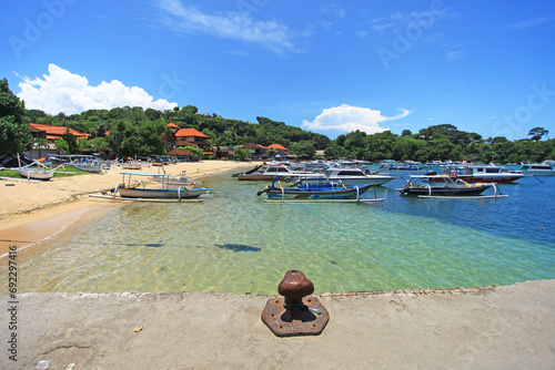 Padangbai in Bali, Indonesia with fishing boats in the sea