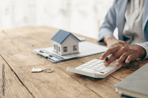 A salesperson or broker offers a special promotion and free insurance to a customer who purchases a real estate sample home is reviewing documents before the customer agrees to sign a contract to purc