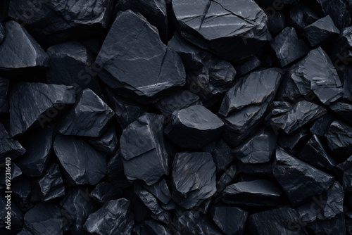 Black Stone Pebble Background: A Minimalist Natural Texture photo