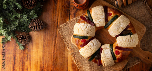 Three Kings Bread also called Rosca de Reyes, Roscon, Epiphany Cake, traditionally served with hot chocolate in a clay Jarrito. Mexican tradition on January 5th.