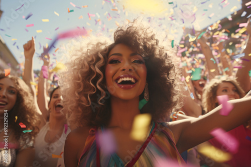 Portrait of a happy woman at a pride parade, confetti in the air