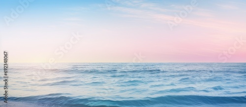 Tranquil Mediterranean seascape, calm waves, soft horizon, dreamlike colors, peaceful nature.
