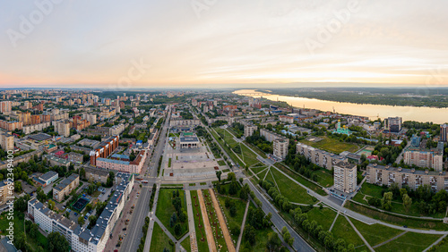 Perm, Russia - August 3, 2020: Central part of the city of Perm. View of the Kama river. Panorama during sunset. Aerial view