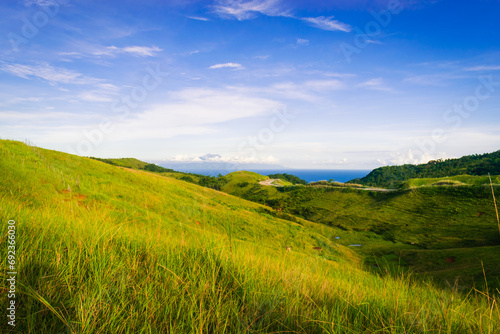 Landscape with mountains and blue sky. Cabaliwan Peak  Romblon  Philippines.