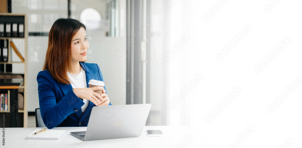 Confident business expert attractive smiling young woman holding digital tablet on desk in creative office... Confident business expert attractive smiling young woman holding digital tablet on desk in creative office...