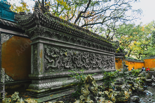 The Nine-Dragon Wall of Fayu temple in Putuo, Zhoushan City, China photo