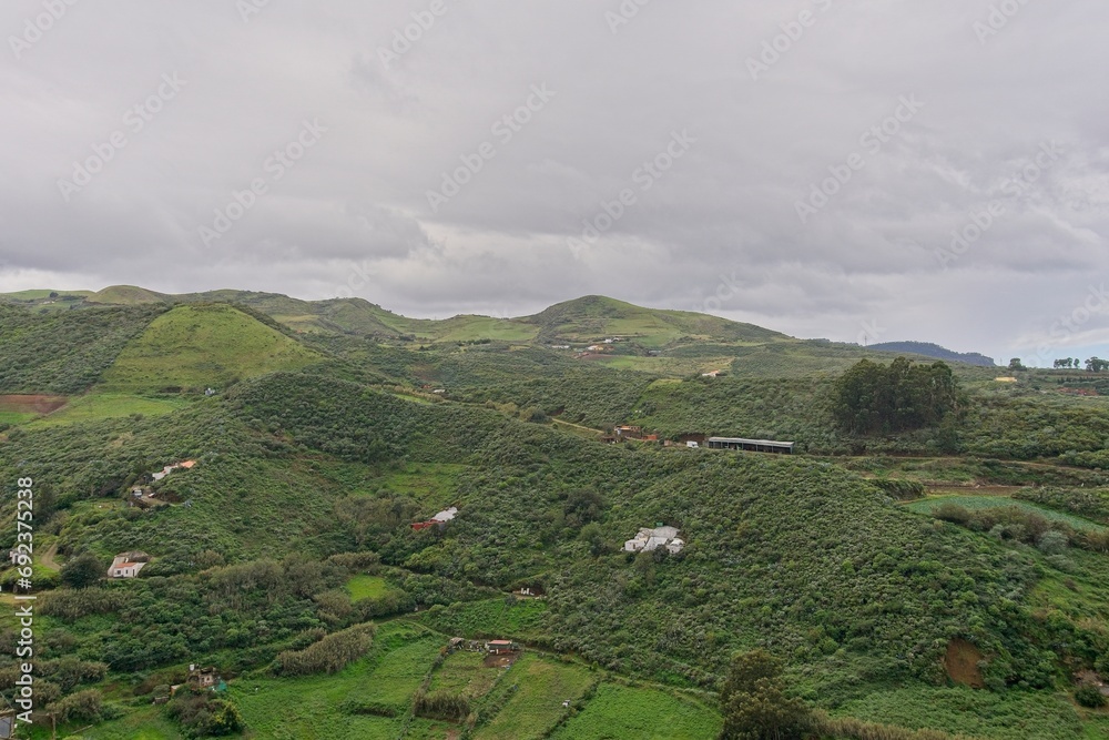 Gran Canaria, Spain: Typical mountain landscape with houses scattered all over the mountain Gran Canaria, Spain: Typical mountain landscape with houses scattered all over the mountain