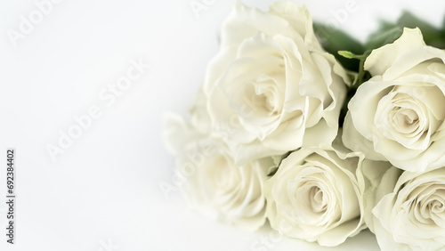 White background with bouquet of roses flower. Greeting card. Summer floral composition. Copy space