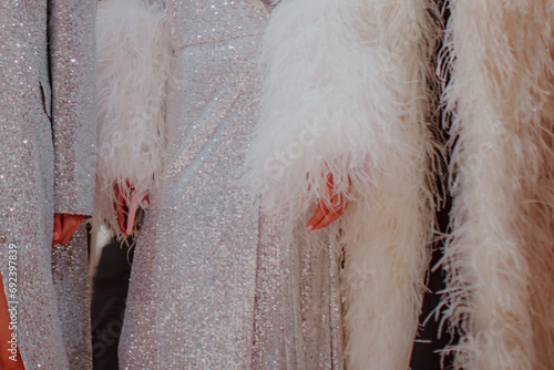 Fotografie Silver white boudoir dresses outfits with white feathers