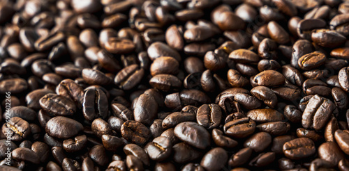 Close up black coffee beans texture background