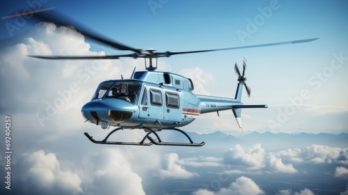 A blue-grey jet-powered helicopter hovering. High stratus clouds fill the sky with breaks showing blue skies 