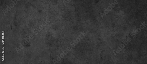 Abstract old stained concrete floor or old grunge background, old vintage charcoal black background  with grunge texture, grainy dark concrete floor or old grunge background, elegant vintage wall.