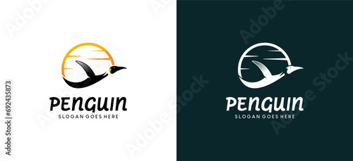 Flying penguin logo design template with sky background