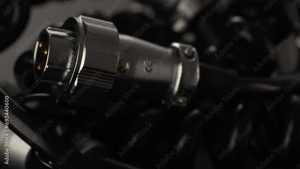 Rotating Power Cables and Connectors for Studio Equipment. Close-up, shallow dof. Rotating Power Cables and Connectors for Studio Equipment. Close-up, shallow dof.