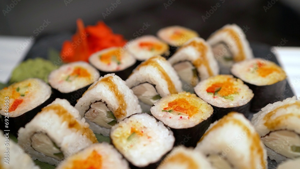Concept of tasty food with sushi, close up. Sushi close-up. Concept of tasty food with sushi, close up. Sushi close-up.