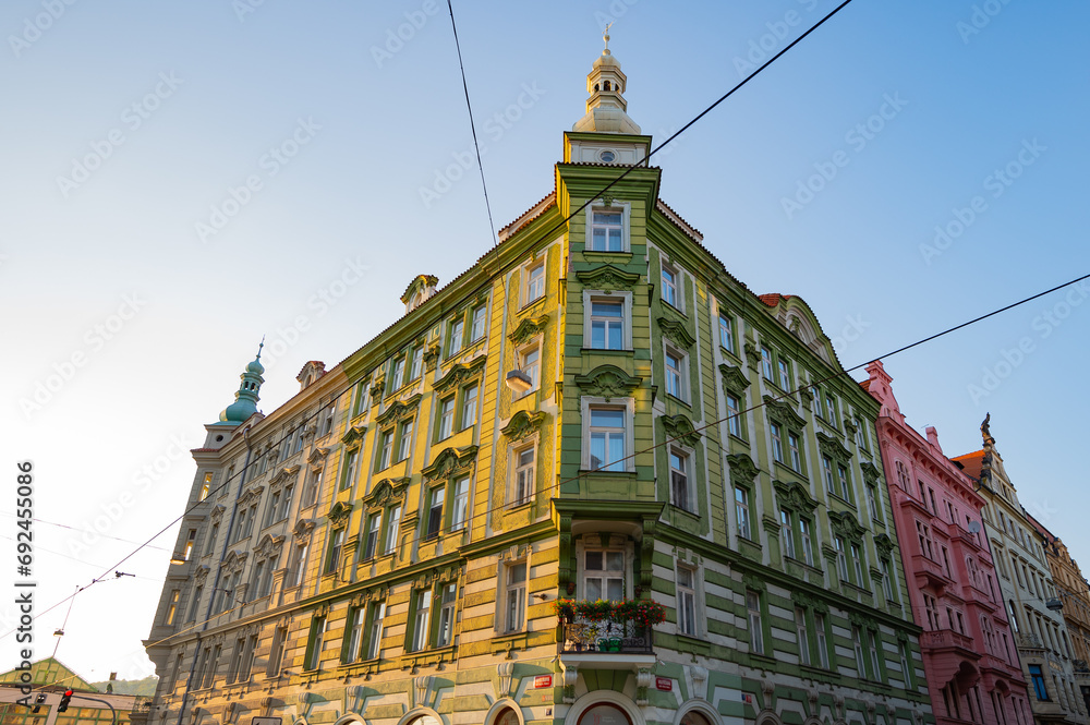 Fototapeta premium Prague, Czech Republic - September 25, 2023 - A walk through the city of Prague by the Vltava River, a dancing house and a sunset.