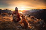girl with a border collie dog in the mountains. girl with a dog on top of mountain enjoying the sunrise. Traveling with a pet.