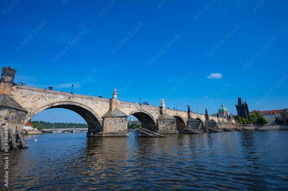 Prague, Czech Republic - September 26, 2023 - View of Charles Bridge, Old Town, Vltava River during a boat trip in Prague.