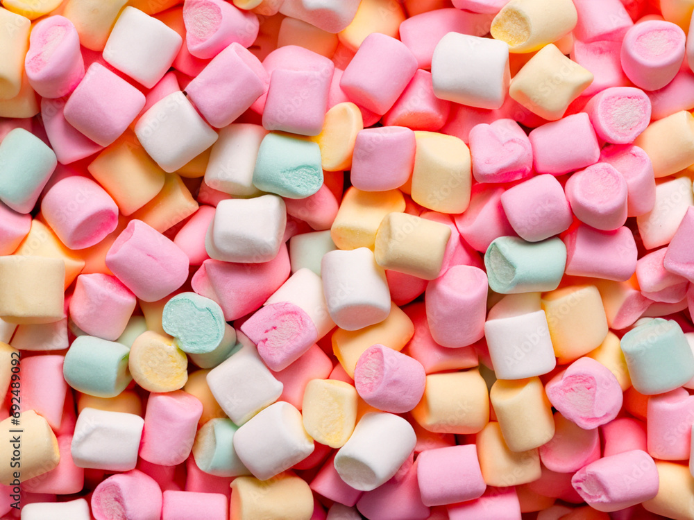 pile of multicolor marshmallows background, top view