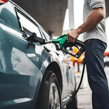 Refueling Car with Gasoline in a Close-up Subject