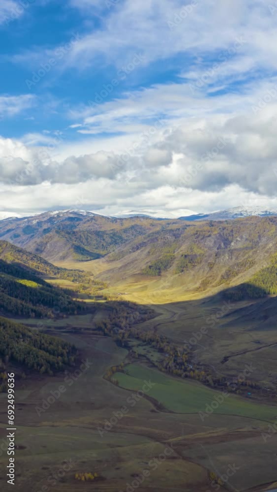 Chike-Taman Pass on a Sunny Day. Aerial Hyper Lapse, Time Lapse. Altai Mountains, Russia.. Vertical Video Chike-Taman Pass on a Sunny Day. Aerial Hyper Lapse, Time Lapse. Altai Mountains, Russia.. Vertical Video
