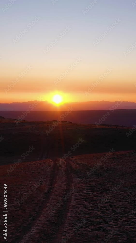 Sunrise in Mountains. Aerial View. Kosh-Agachsky District, The Altai Mountains, Russia. Drone Flies Forward at Low Level. Vertical Video Sunrise in Mountains. Aerial View. Kosh-Agachsky District, The Altai Mountains, Russia. Drone Flies Forward at Low Level. Vertical Video