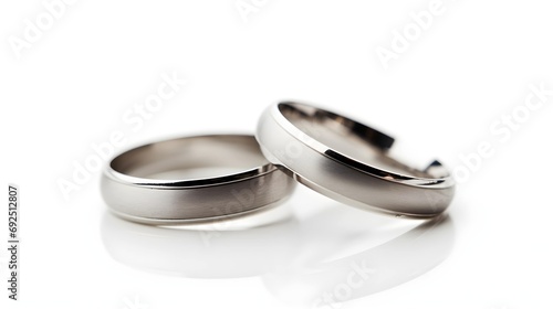 Pair of silver Wedding ring on a white background, macro shot