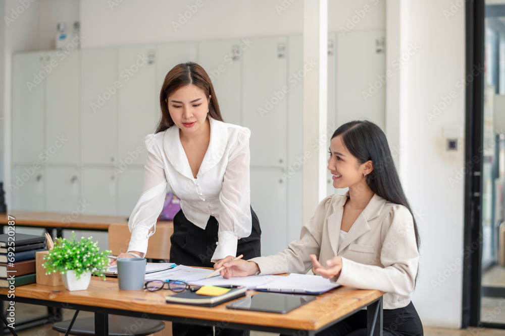 Two business worker consult and plan together. Brainstorm, share, and discuss business project ideas. Two business worker consult and plan together. Brainstorm, share, and discuss business project ideas.