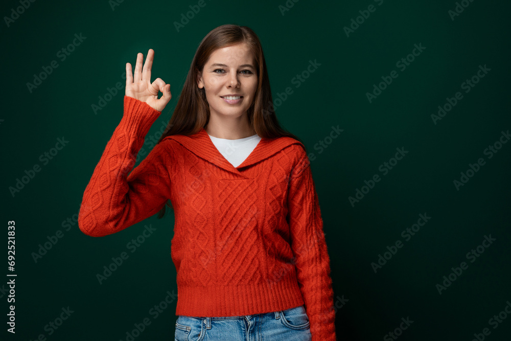 Smart young woman with brown hair telling news and gesturing Smart young woman with brown hair telling news and gesturing