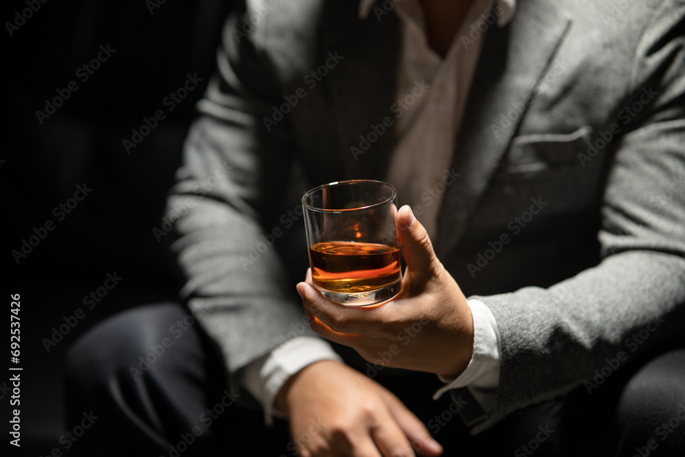 Businessmen in suits drinking Celebrate whiskey Businessmen in suits drinking Celebrate whiskey