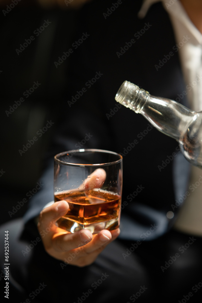 Businessmen in suits drinking Celebrate whiskey Businessmen in suits drinking Celebrate whiskey