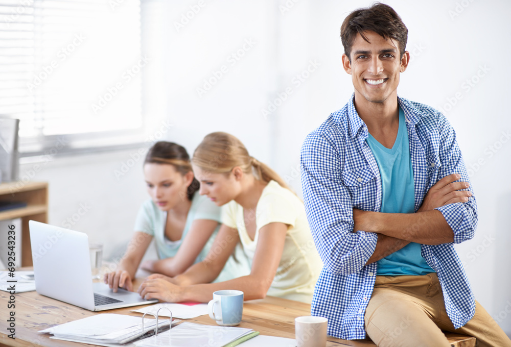 Business portrait of happy man at desk with team, laptop and paperwork at coworking accounting office. Happy startup, manager and women on website for admin documents at online tax consulting agency.