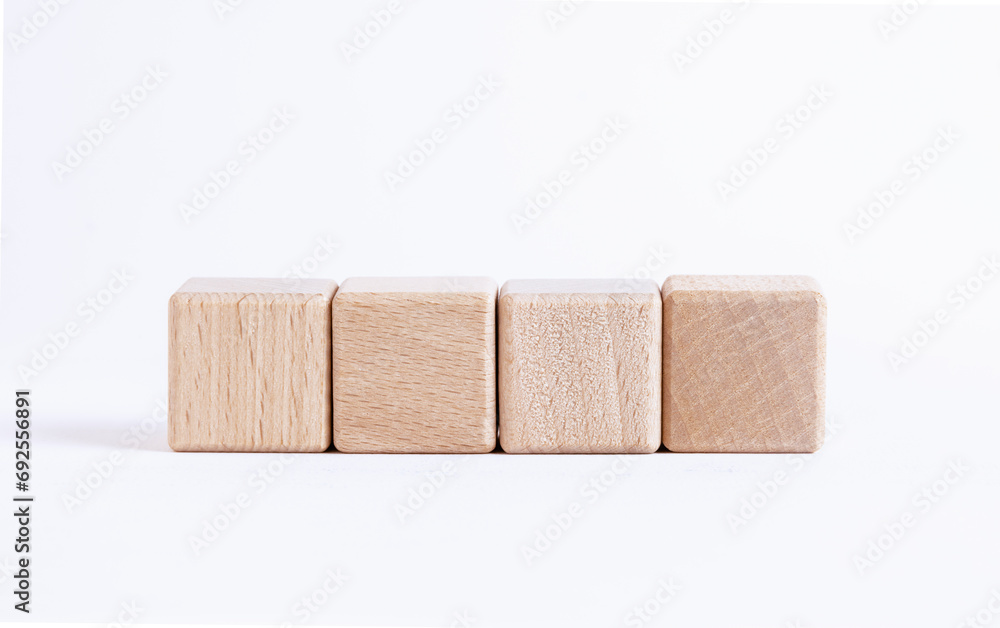Obraz premium Wooden toy cubes isolated on a white