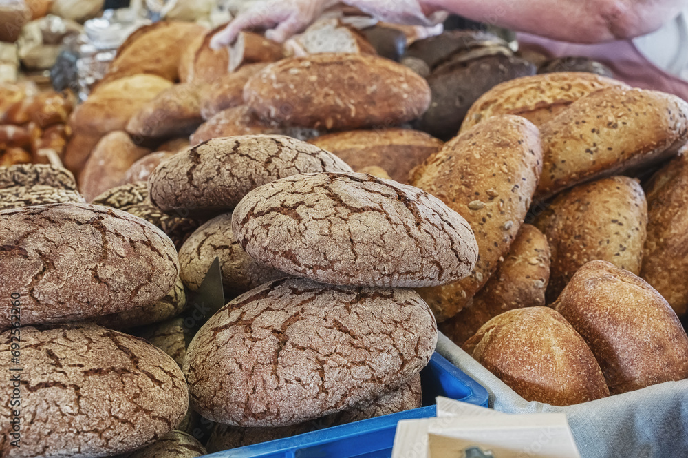 Assortment of bakery products. Different types of bread on display at a farm food fair