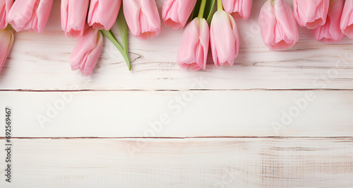 pink tulips on wooden background #692569467