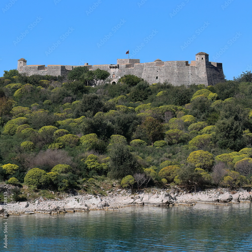 Ali Pasha castle, island within the Porto Palermo Bay of the Ionian sea connected to the mainland by a land strip. Himare-Albania-124