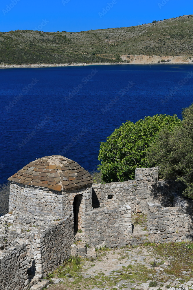 Survey tower, Ali Pasha castle lower terrace, island of Porto Palermo Bay connected to the mainland by a land strip. Himare-Albania-132