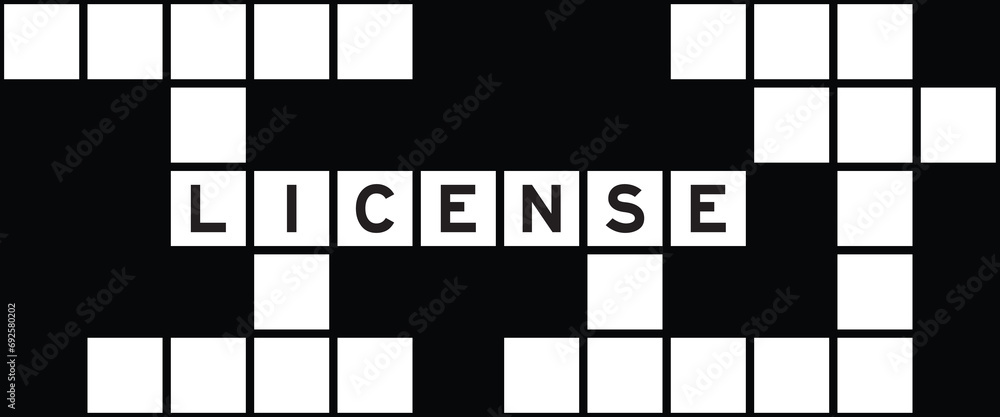 Fototapeta premium Alphabet letter in word license on crossword puzzle background