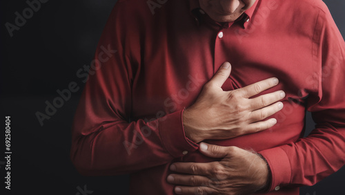Photo of a man complaining of chest pain and suspected of having a myocardial infarction photo